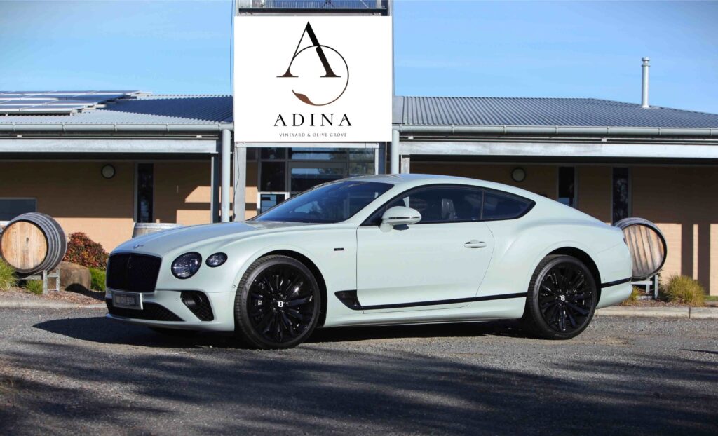 Bentley GT parked outside the Cellar Door at Adina Vineyard